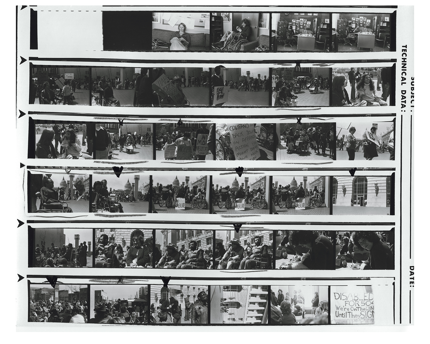 Black and white sheet of many photos, six rows of film strip lay across